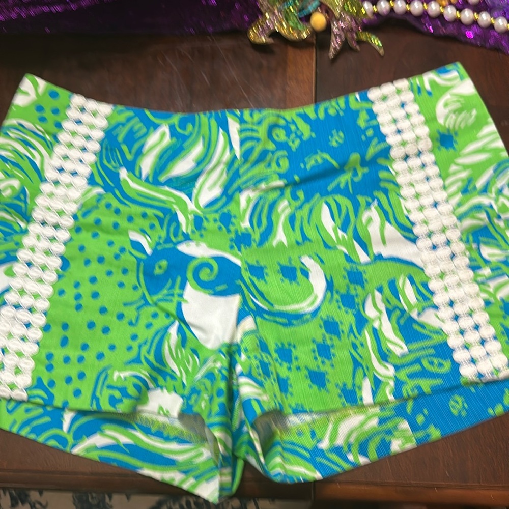 Lilly Pulitzer shorts. Flat front, very flattering.